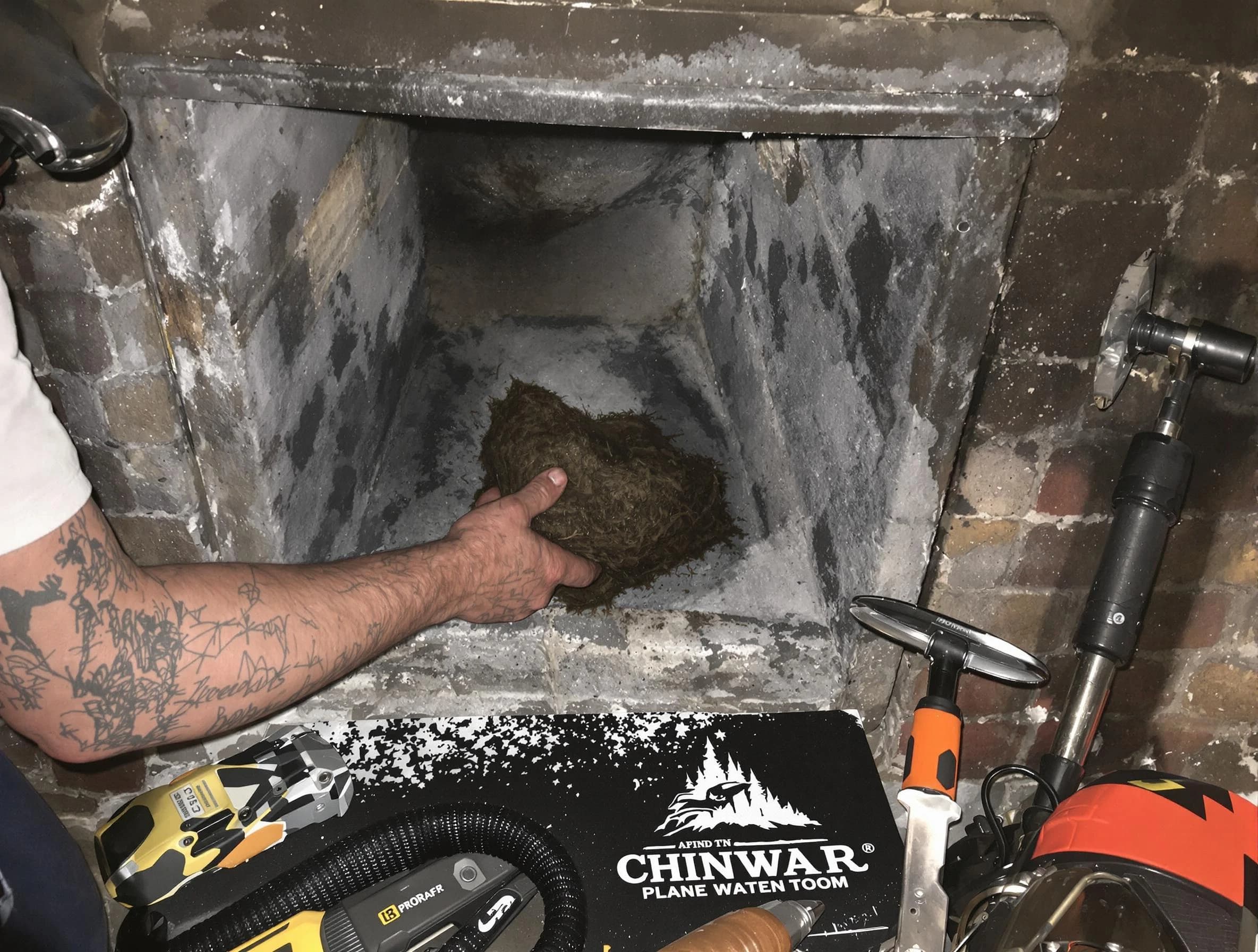 Slaughterville Chimney Sweep safely removing debris and screening chimney in Slaughterville, OK